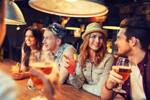 Friends drinking at a bar Group of Friends at a Great Local Bar